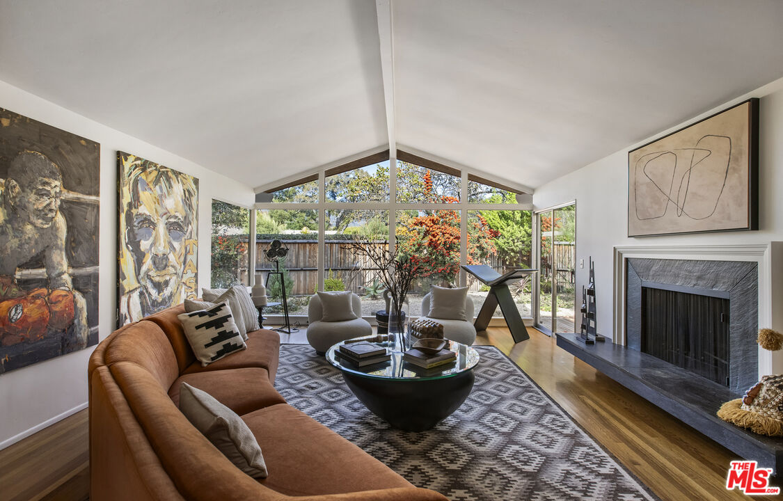 921 North San Marcos Road Santa Barbara, CA 93111 - Photo 2 of 44 a living room with furniture and a fireplace