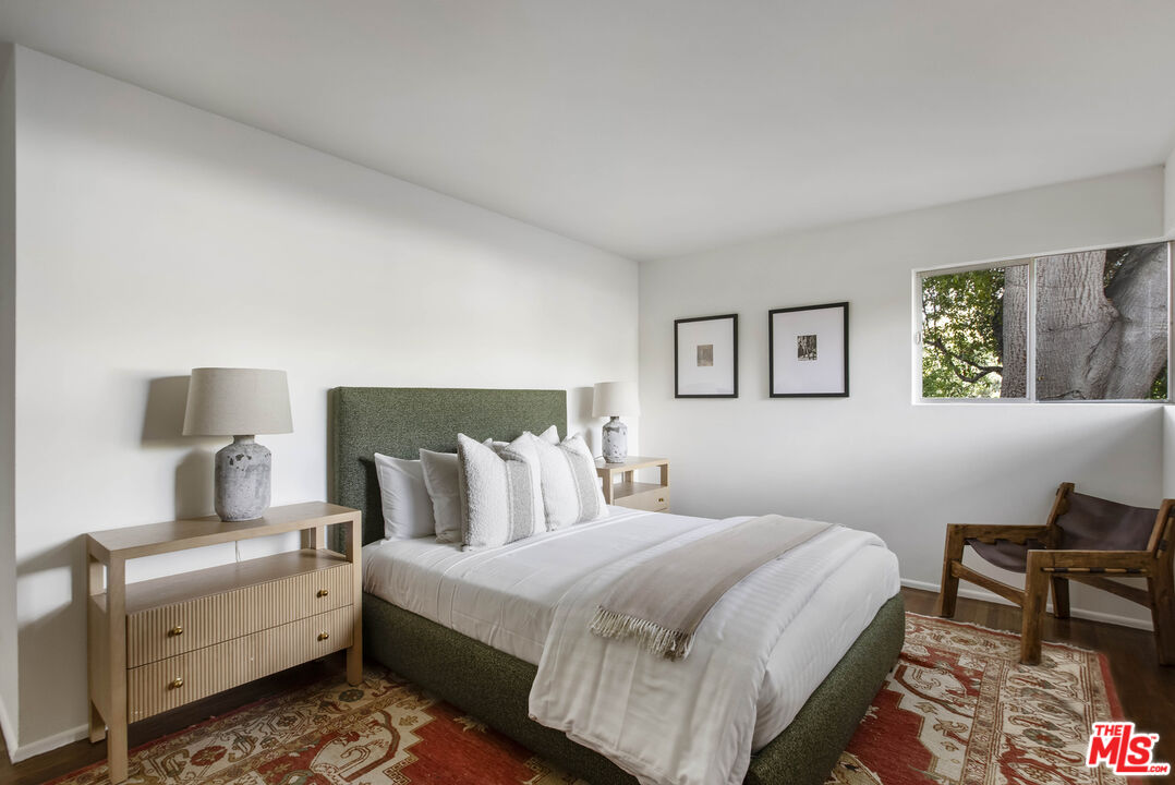 921 North San Marcos Road Santa Barbara, CA 93111 - Photo 28 of 44 a bedroom with a bed and a lamp on dresser