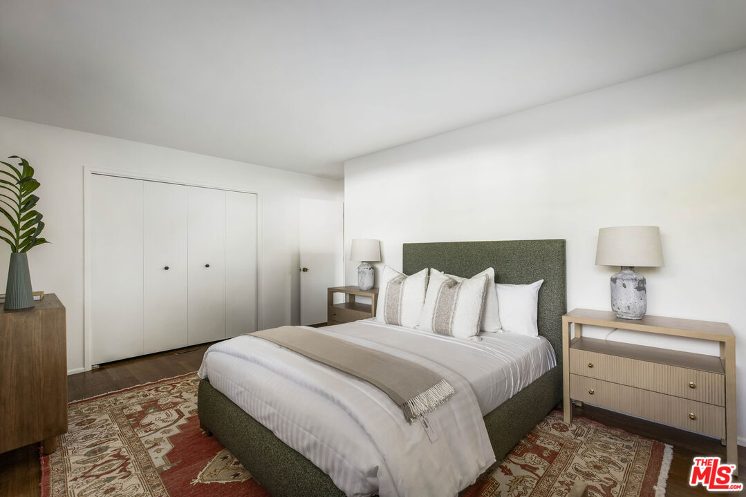 921 North San Marcos Road Santa Barbara, CA 93111 - Photo 29 of 44 a bedroom with a bed and a potted plant