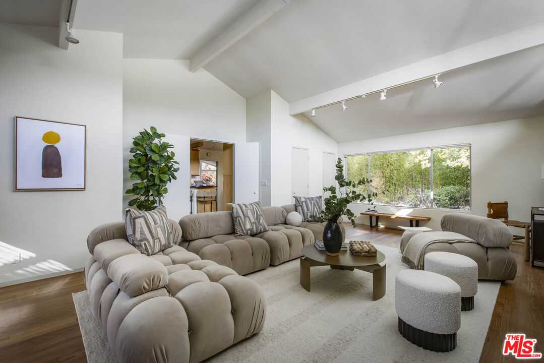 921 North San Marcos Road Santa Barbara, CA 93111 - Photo 33 of 44 a living room with furniture and a large window
