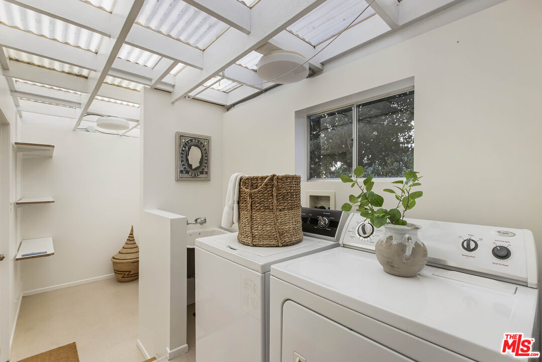921 North San Marcos Road Santa Barbara, CA 93111 - Photo 37 of 44 a kitchen with a sink and a potted plant