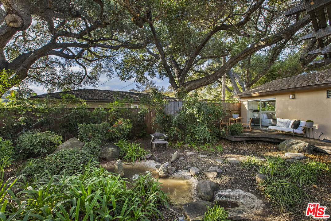 921 North San Marcos Road Santa Barbara, CA 93111 - Photo 40 of 44 a view of a backyard with large trees