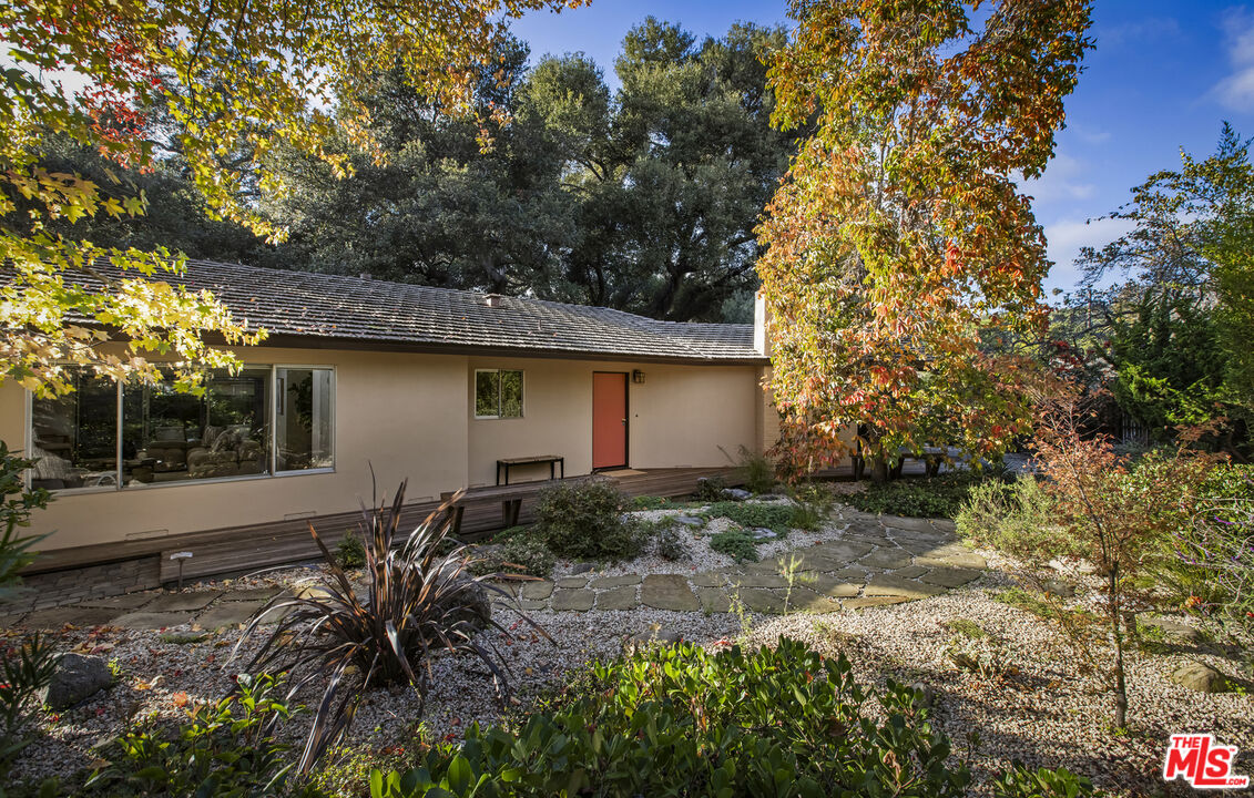 921 North San Marcos Road Santa Barbara, CA 93111 - Photo 6 of 44 a backyard of a house with plants and trees