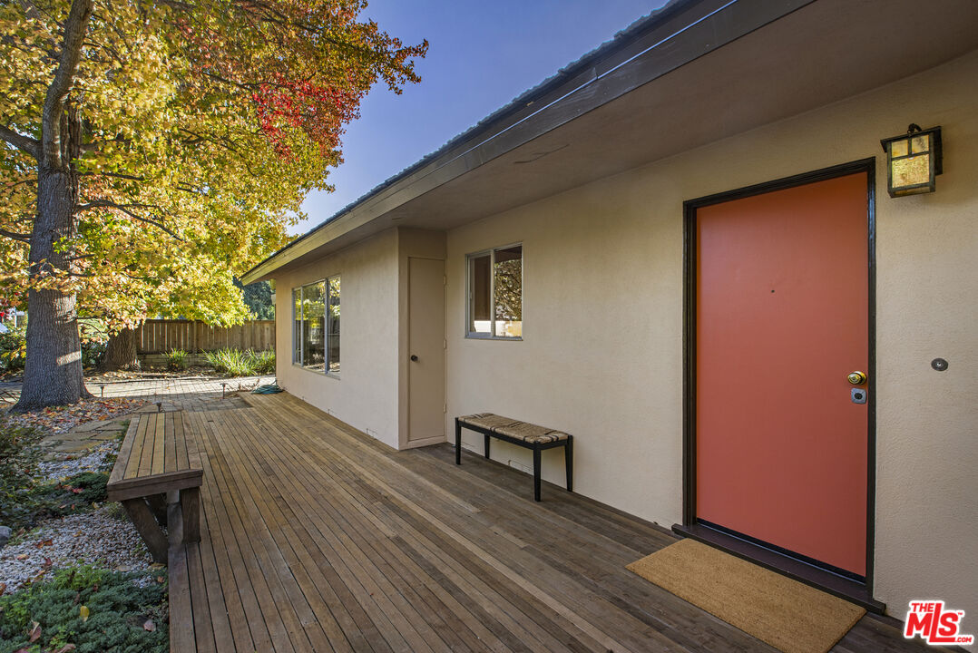 921 North San Marcos Road Santa Barbara, CA 93111 - Photo 9 of 44 a view of a house with wooden floor and a yard