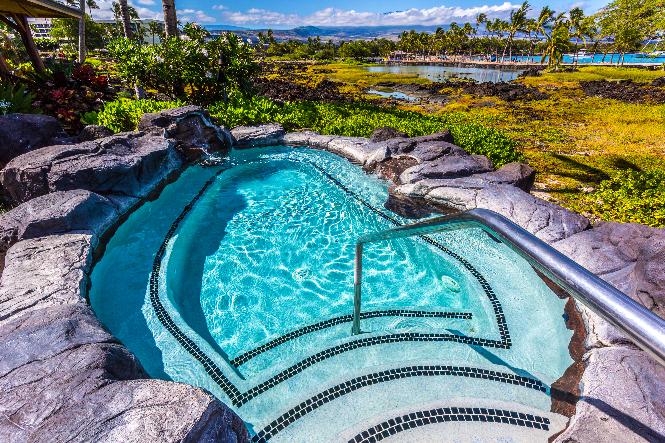 69-1000 Kolea Kai Circle, Unit 9E Waikoloa, HI 96738 - Photo 18 of 27 a view of a swimming pool with a lake view
