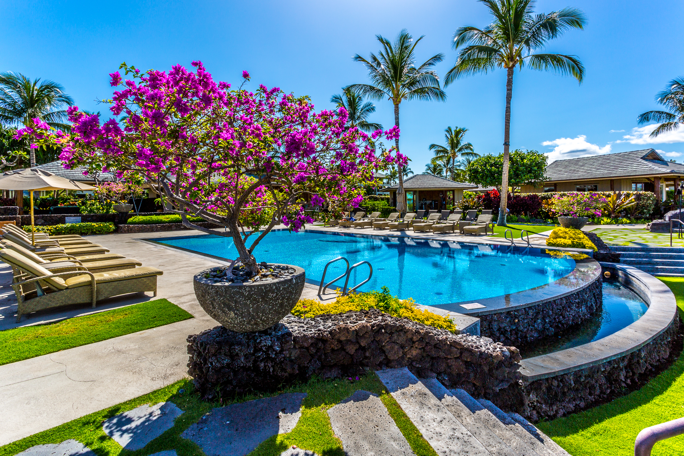 69-1000 Kolea Kai Circle, Unit 9E Waikoloa, HI 96738 - Photo 19 of 27 a view of a swimming pool with a yard
