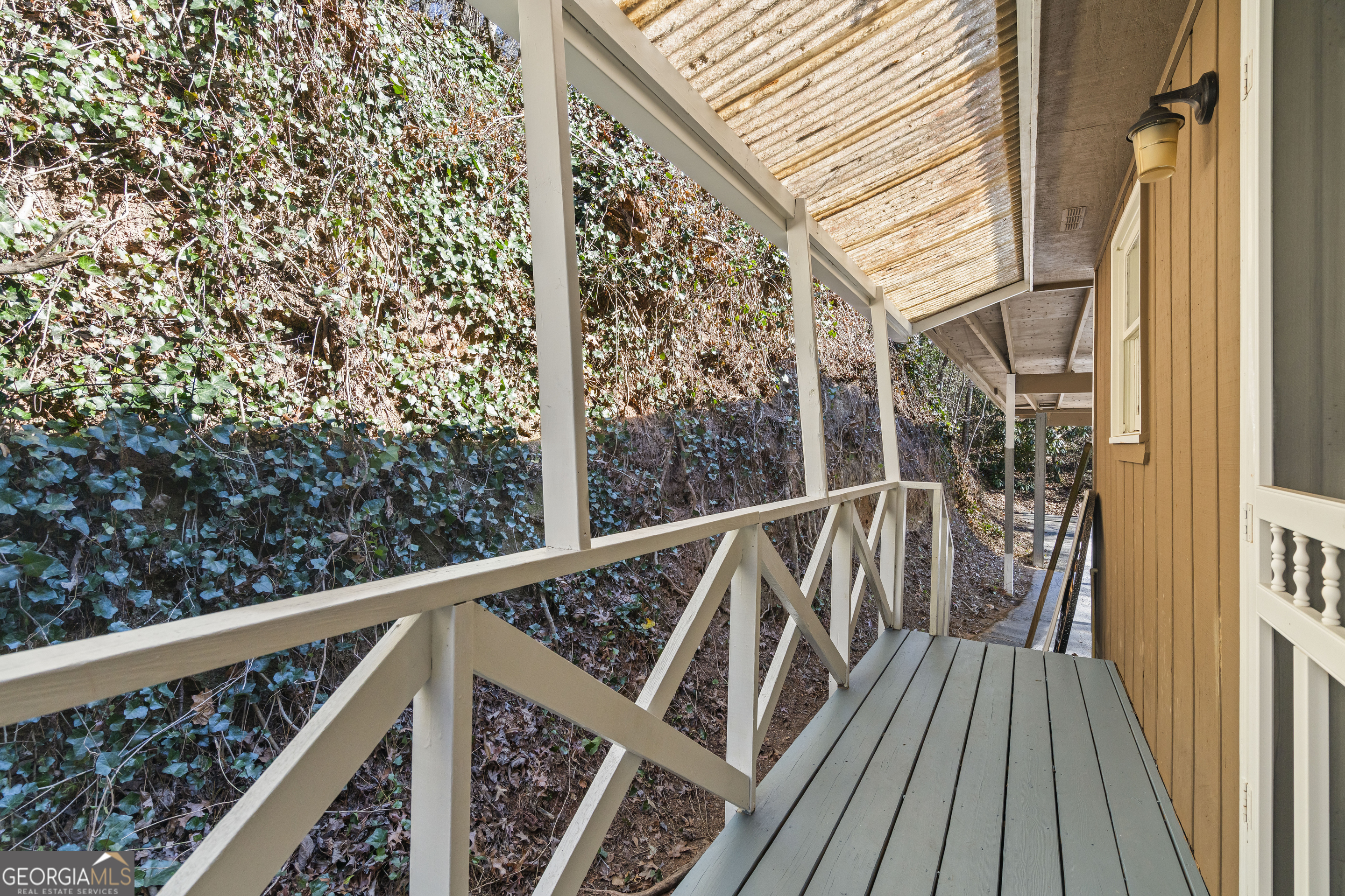 1131 Joe Davis Road Tiger, GA 30576 - Photo 12 of 45 a view of balcony with wooden floor and fence