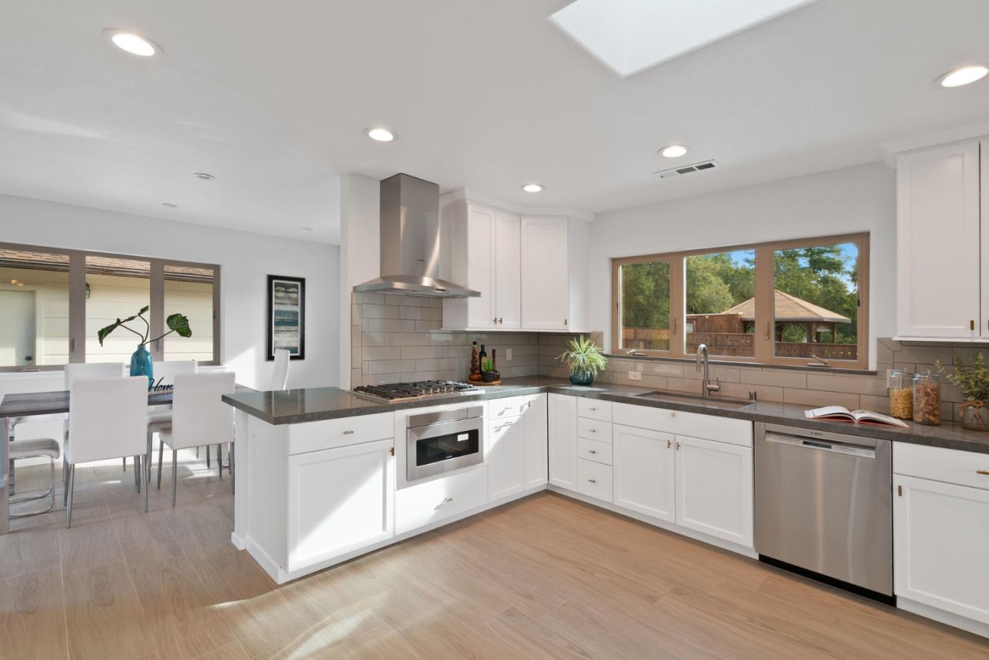 350 Sims Road Santa Cruz, CA 95060 - Photo 12 of 40 a kitchen with a sink stove and cabinets
