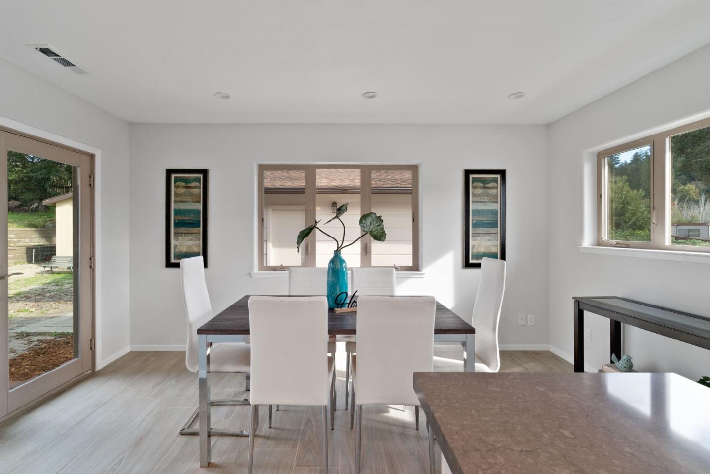 350 Sims Road Santa Cruz, CA 95060 - Photo 13 of 40 a view of a dining room with furniture window and wooden floor
