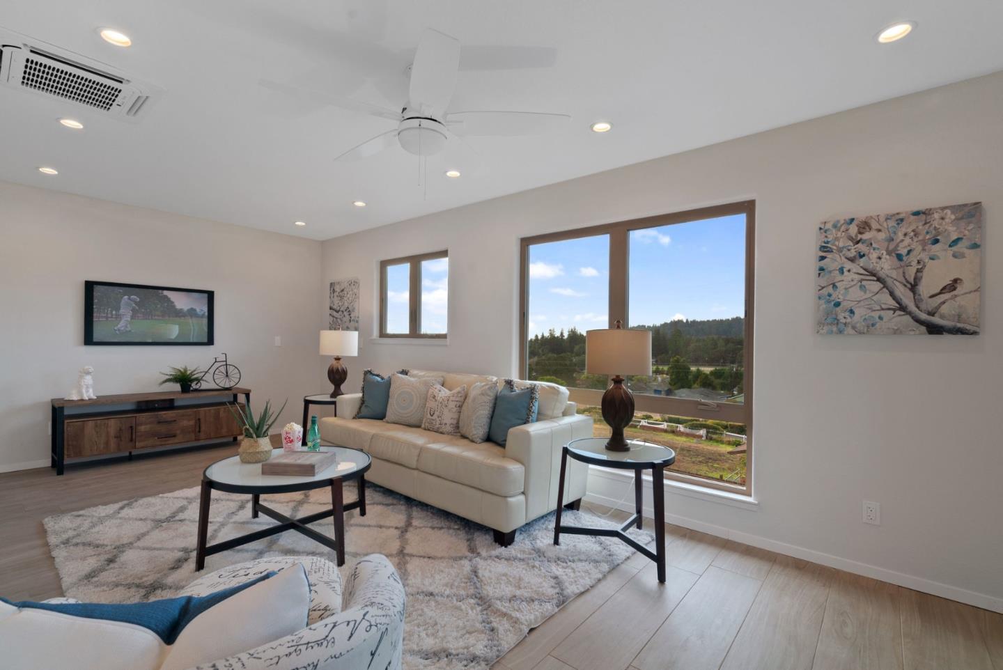 350 Sims Road Santa Cruz, CA 95060 - Photo 24 of 40 a living room with furniture and a flat screen tv