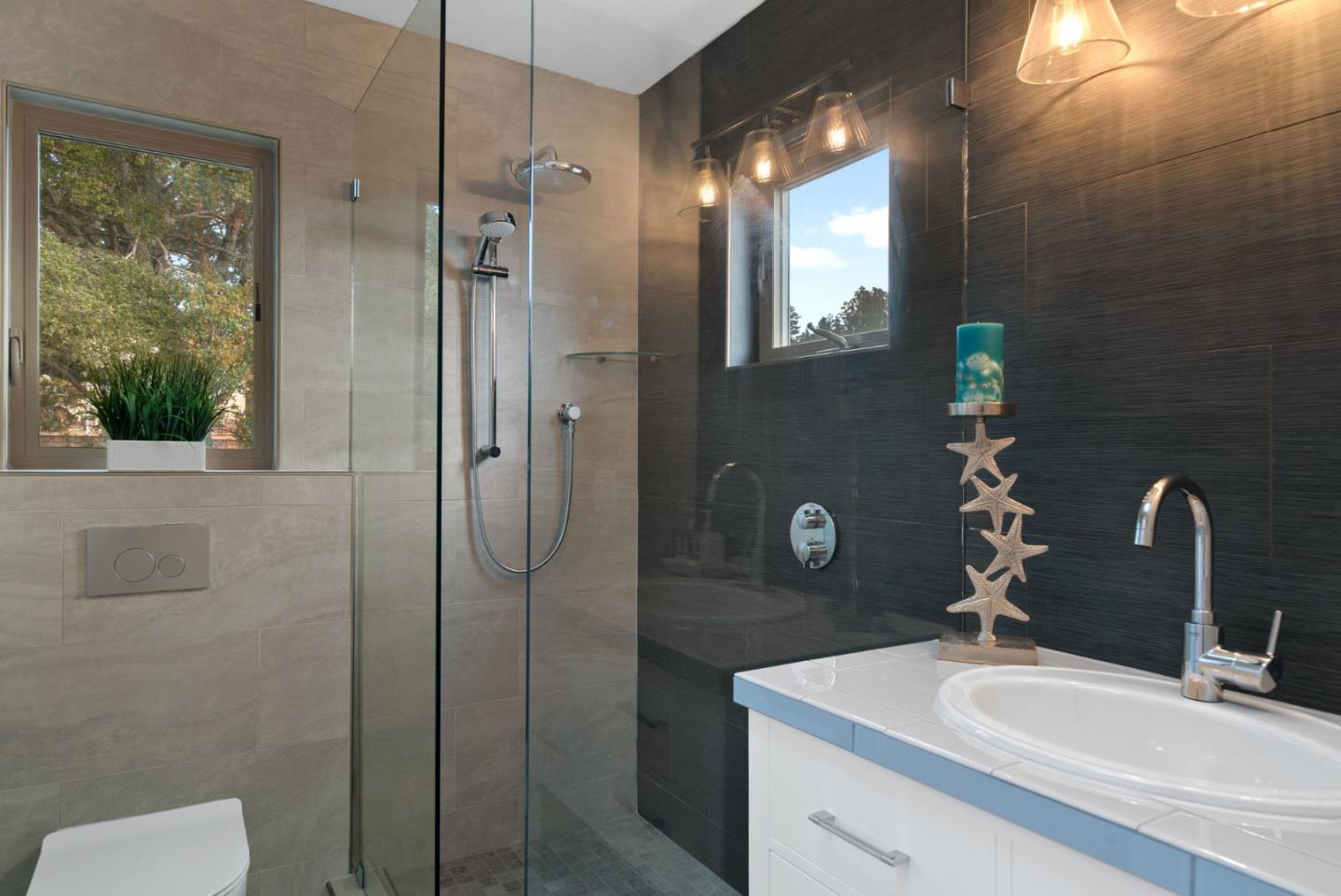 350 Sims Road Santa Cruz, CA 95060 - Photo 27 of 40 a bathroom with a sink a toilet and shower