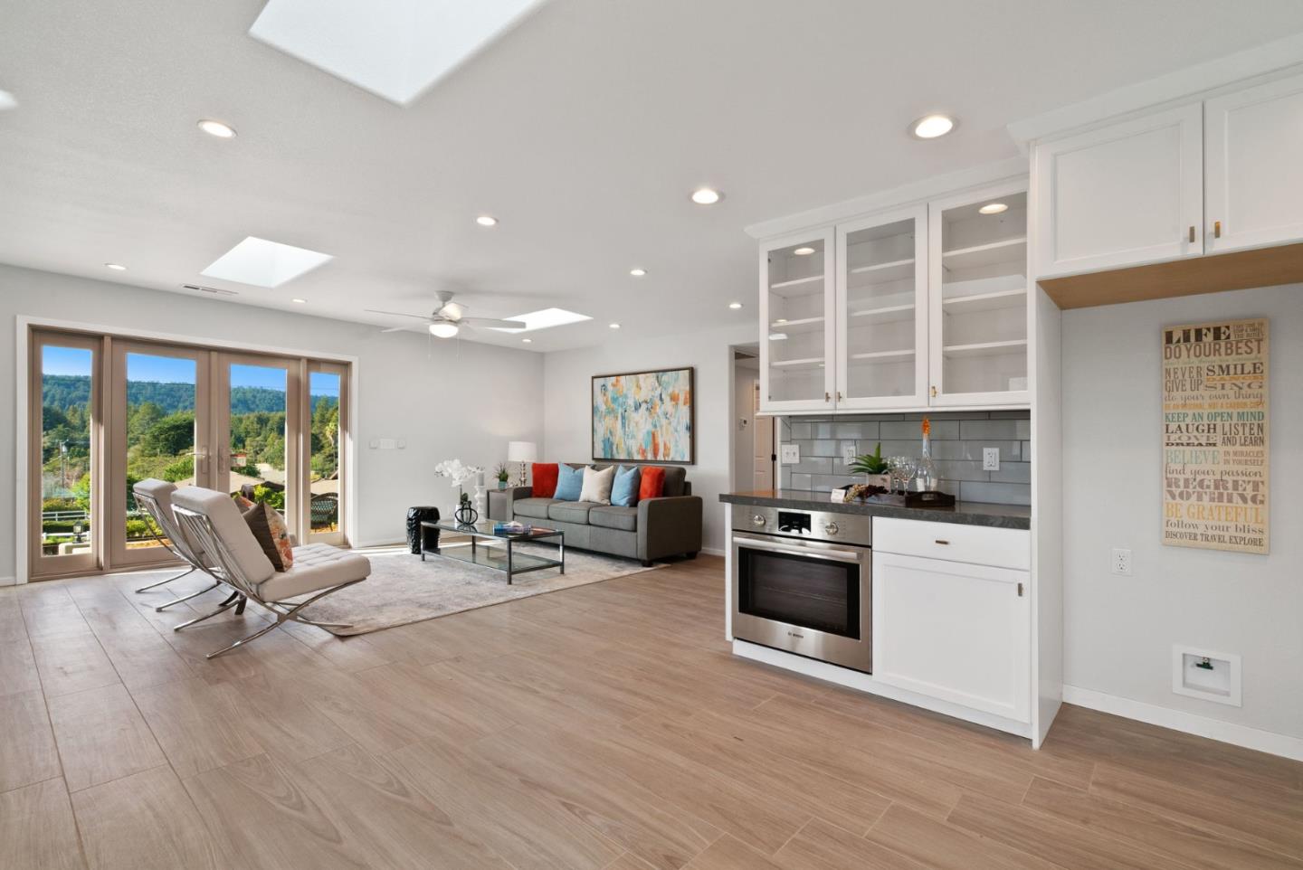 350 Sims Road Santa Cruz, CA 95060 - Photo 9 of 40 a view of a kitchen with cabinets stainless steel appliances and wooden floor