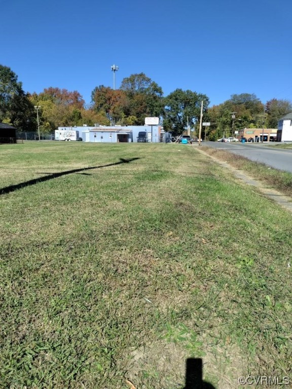 a view of a field with an trees