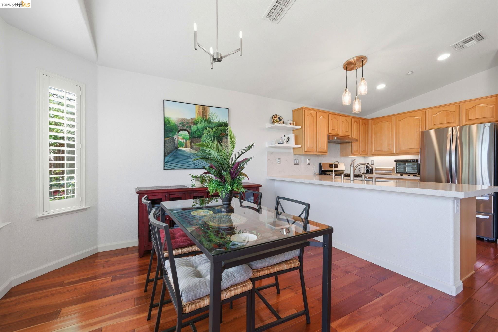 1024 Diamante Rio Vista, CA 94571 - Photo 7 of 27 Open-concept kitchen and dining area featuring wood-finish flooring