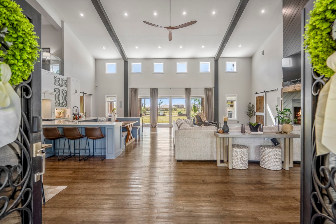 14972 Quinette Road Conroe, TX 77302 - Photo 4 of 50 Open plan living room and kitchen with plenty of natural light