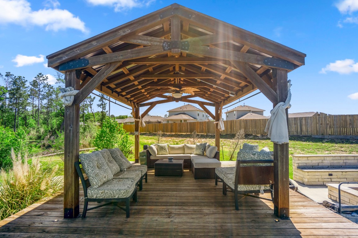 14972 Quinette Road Conroe, TX 77302 - Photo 45 of 50 Pond with dock, seating area and dock