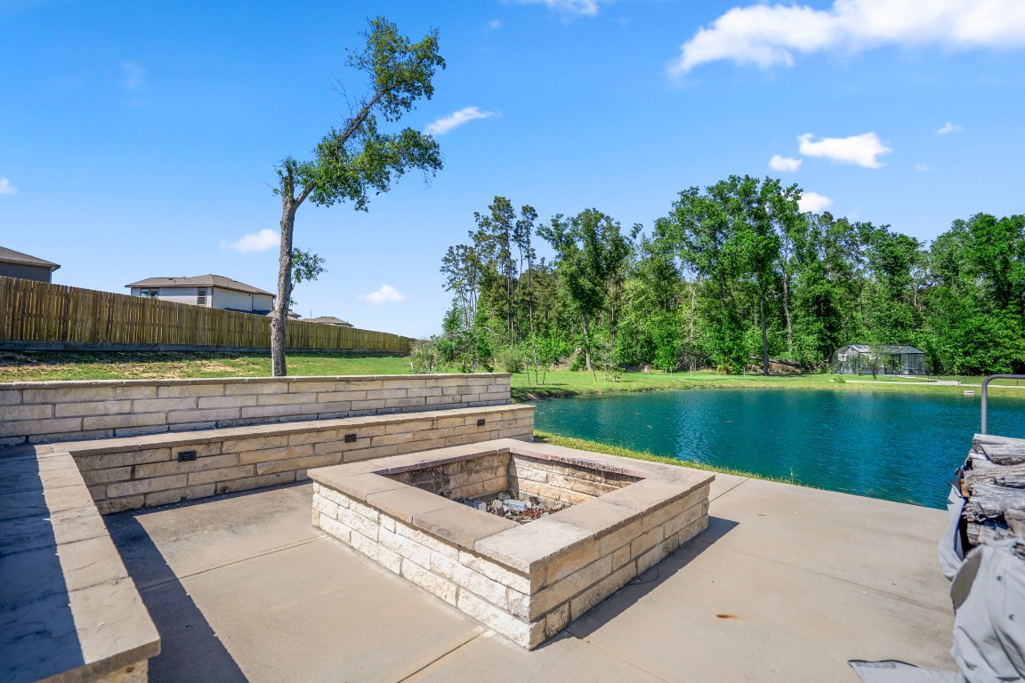 14972 Quinette Road Conroe, TX 77302 - Photo 46 of 50 Pond with dock, seating area and dock