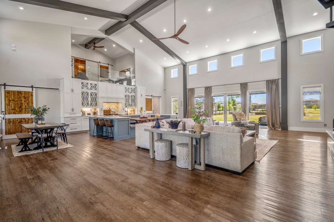 14972 Quinette Road Conroe, TX 77302 - Photo 5 of 50 Open plan living room and kitchen with plenty of natural light
