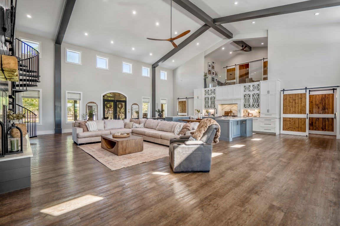 14972 Quinette Road Conroe, TX 77302 - Photo 6 of 50 Open plan living room and kitchen with plenty of natural light