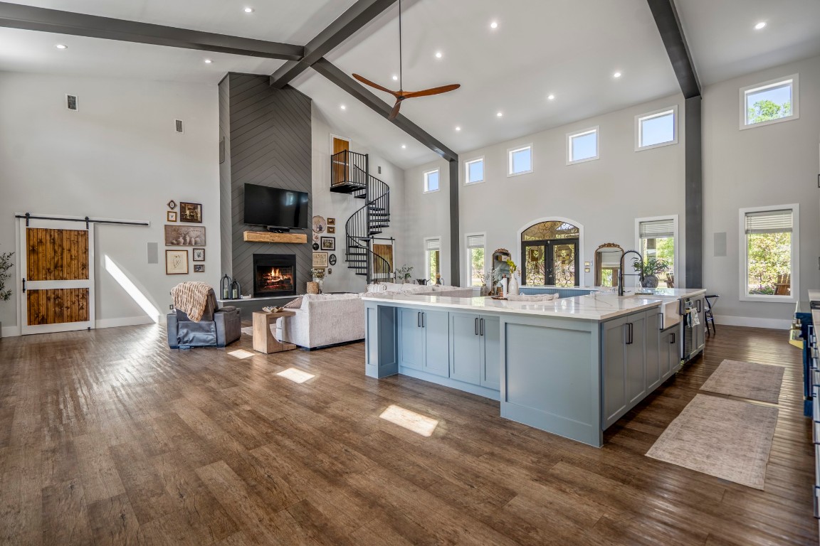 14972 Quinette Road Conroe, TX 77302 - Photo 7 of 50 Open plan living room and kitchen with plenty of natural light