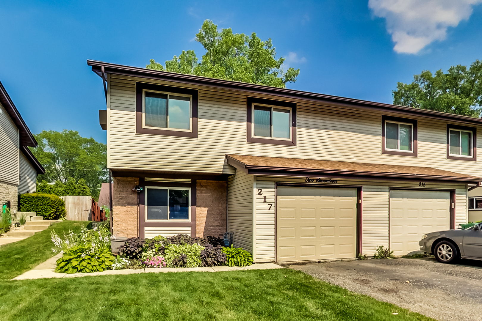 217 Troy Lane Lombard, IL 60148 - Photo 1 of 30 front view of a house with a yard