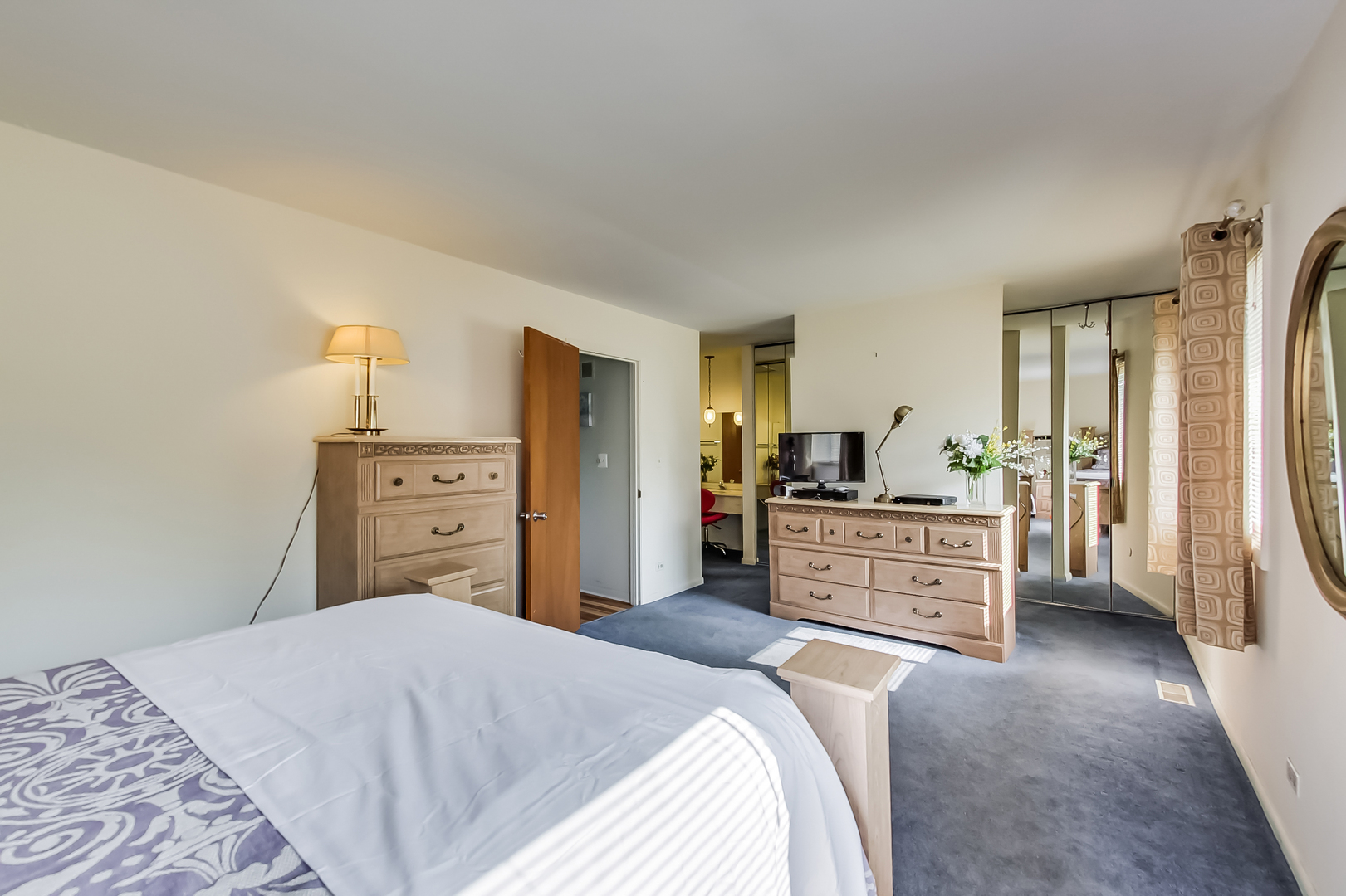 217 Troy Lane Lombard, IL 60148 - Photo 11 of 30 a bedroom with a bed dresser and a large window
