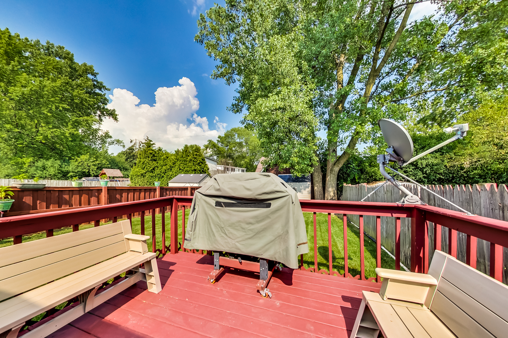 217 Troy Lane Lombard, IL 60148 - Photo 24 of 30 a view of a roof deck with wooden floor and fence
