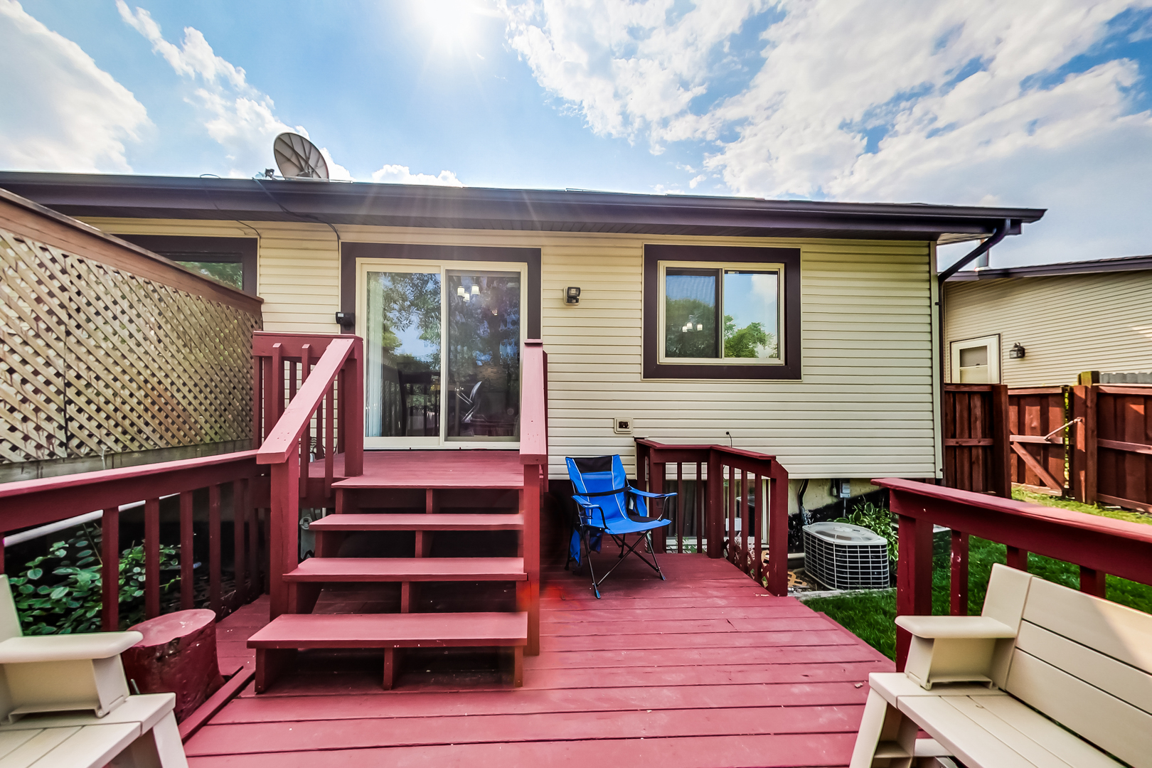217 Troy Lane Lombard, IL 60148 - Photo 25 of 30 a view of a deck with wooden floor and furniture