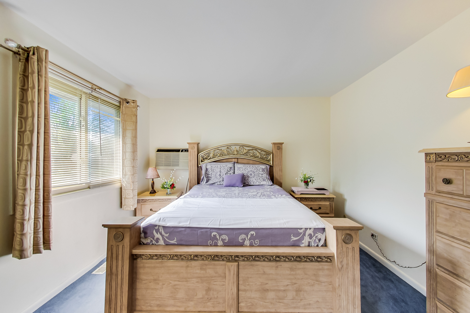 217 Troy Lane Lombard, IL 60148 - Photo 10 of 30 a bedroom with a bed and wooden floor