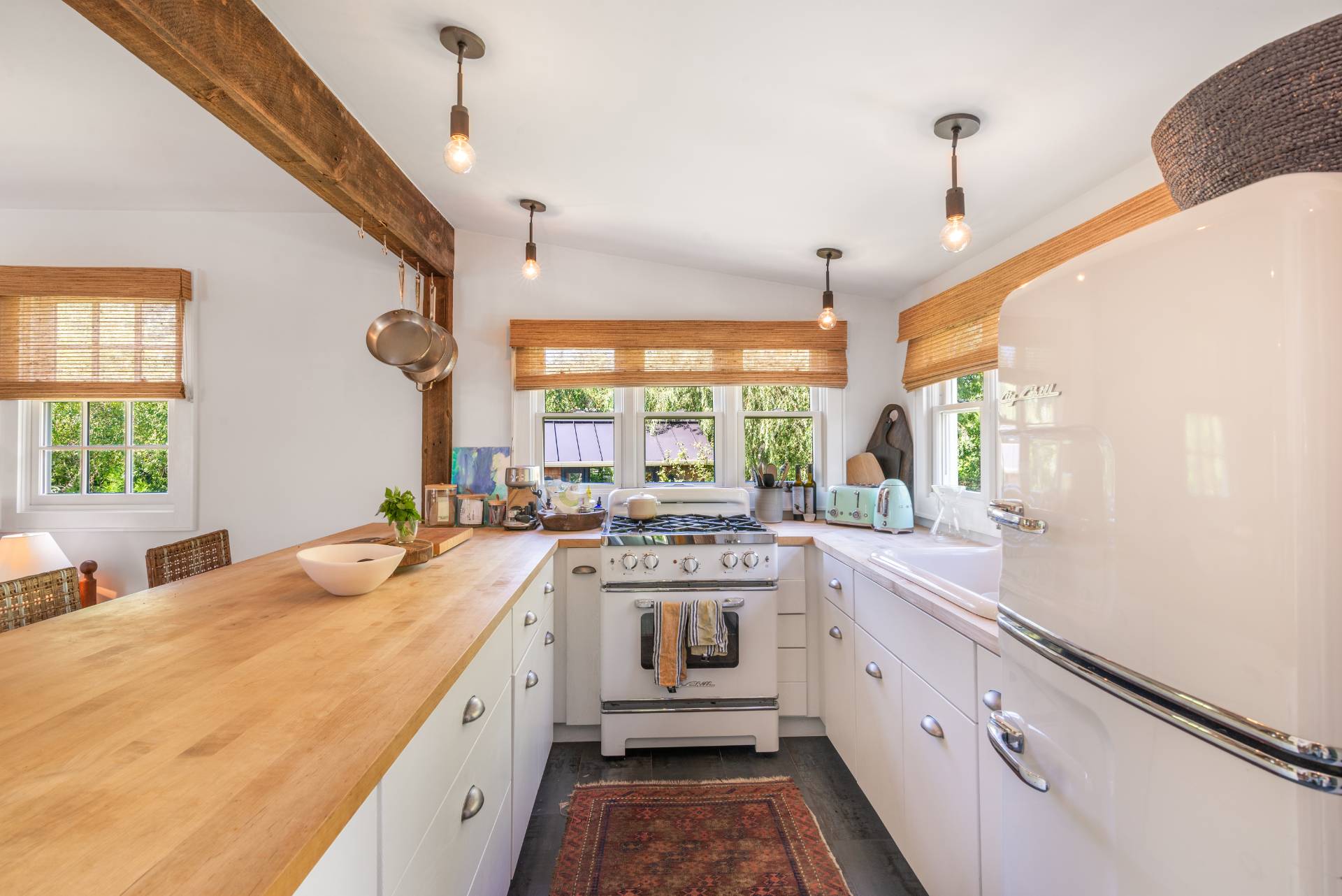 12 Jackson Road Montauk, NY 11954 - Photo 12 of 36 a kitchen with sink stove and refrigerator