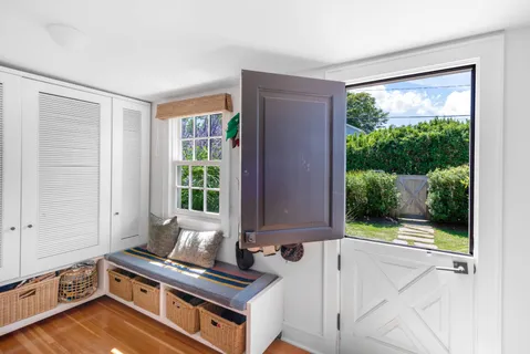 a view of a living room and hardwood floor