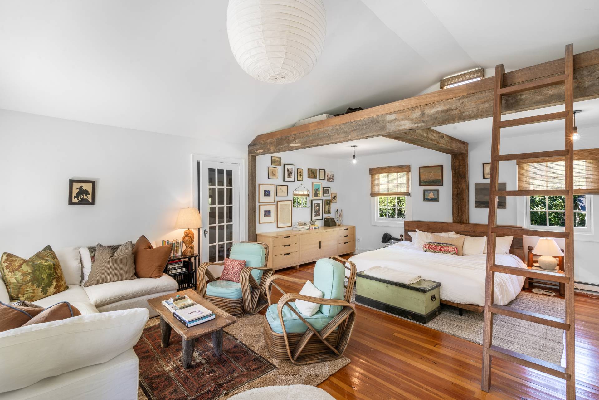 12 Jackson Road Montauk, NY 11954 - Photo 7 of 36 a bedroom with furniture and a large window