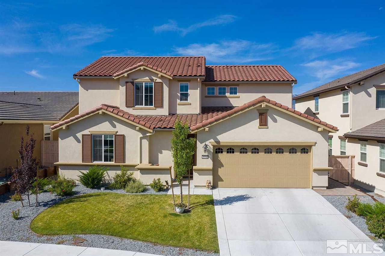10741 Ridgebrook Drive Reno, NV 89521 - Photo 1 of 25 a front view of a house with a yard