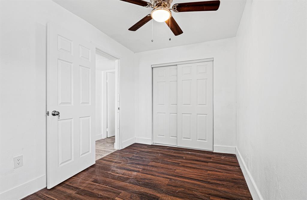 7007 Northwest 64th Street Tamarac, FL 33321 - Photo 17 of 41 a view of empty room with wooden floor