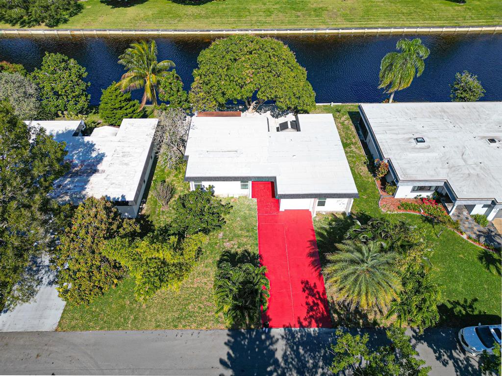7007 Northwest 64th Street Tamarac, FL 33321 - Photo 2 of 41 an aerial view of a house