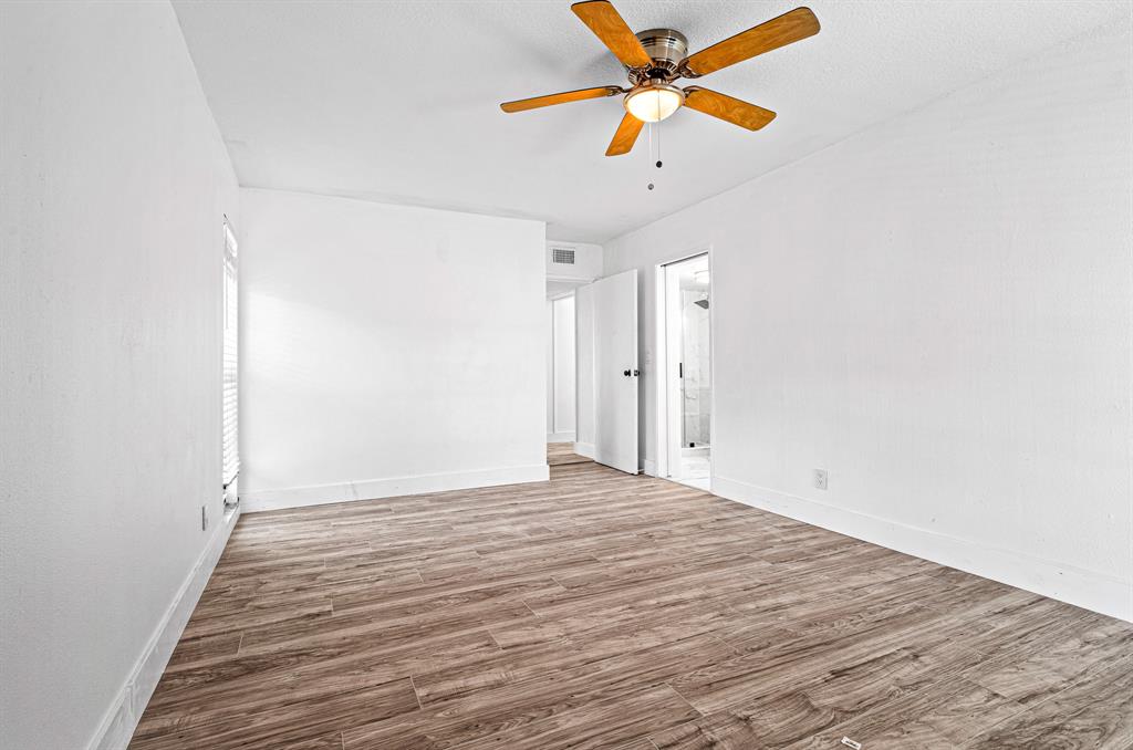 7007 Northwest 64th Street Tamarac, FL 33321 - Photo 24 of 41 wooden floor in an empty room