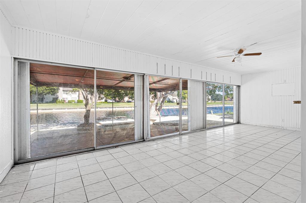 7007 Northwest 64th Street Tamarac, FL 33321 - Photo 30 of 41 a view of an empty room with a large window