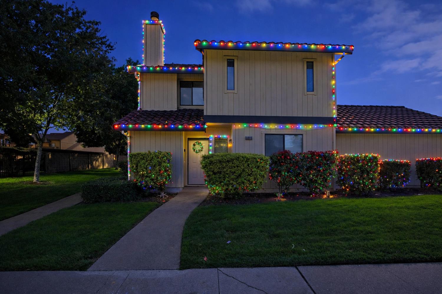 6880 Calvine Road Sacramento, CA 95823 - Photo 1 of 1 a front view of a house with a yard and garage