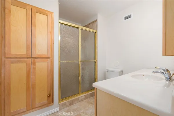 a bathroom with a sink and a toilet