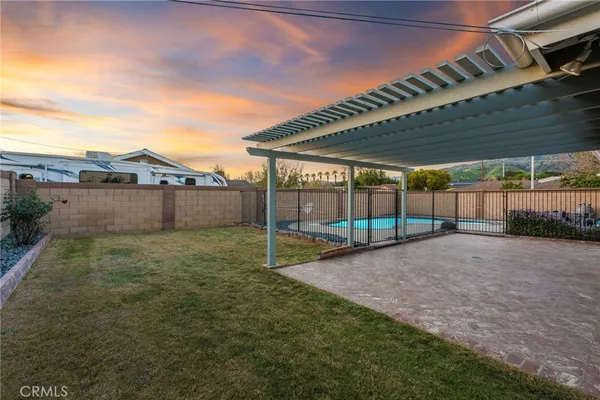 a view of porch with green space