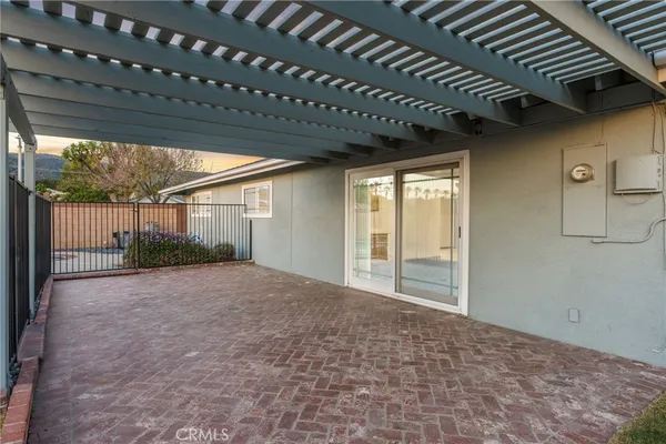a view of a swimming pool with a chairs