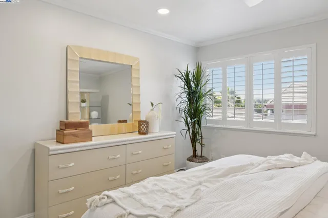 a bathroom with a sink double vanity and a window
