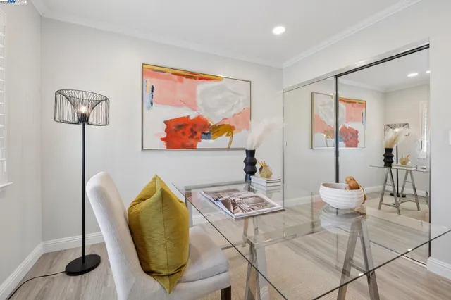 a bathroom with a sink toilet and window
