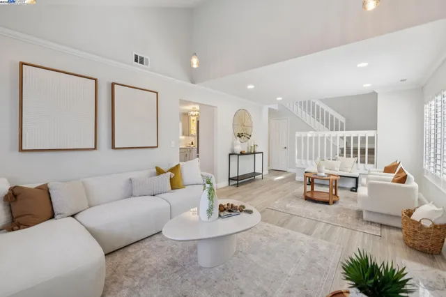 a living room with furniture and a couch