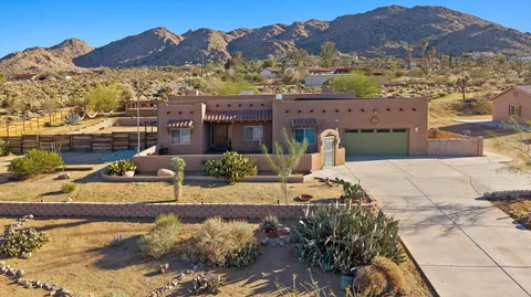 a view of a house with a ocean view