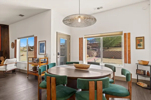 a kitchen with stainless steel appliances granite countertop a stove and cabinets