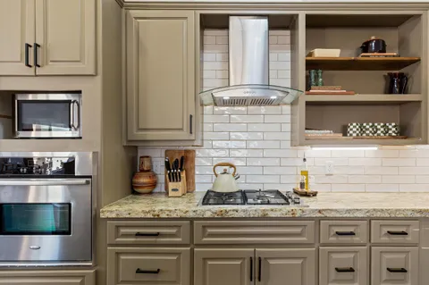 a bedroom with bed and window