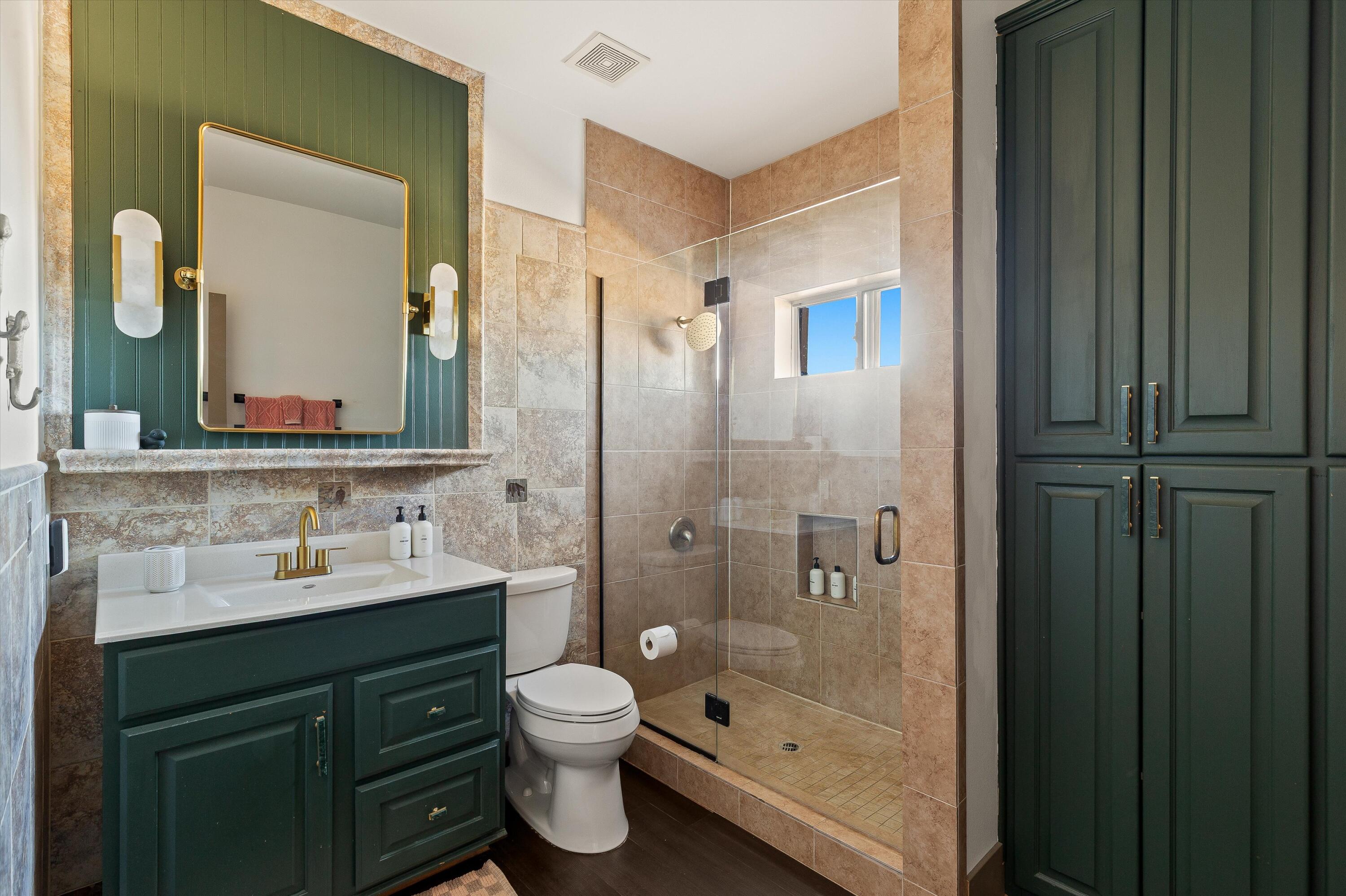 60377 Pueblo Trail Joshua Tree, CA 92252 - Photo 27 of 57 a bathroom with a sink a toilet and shower