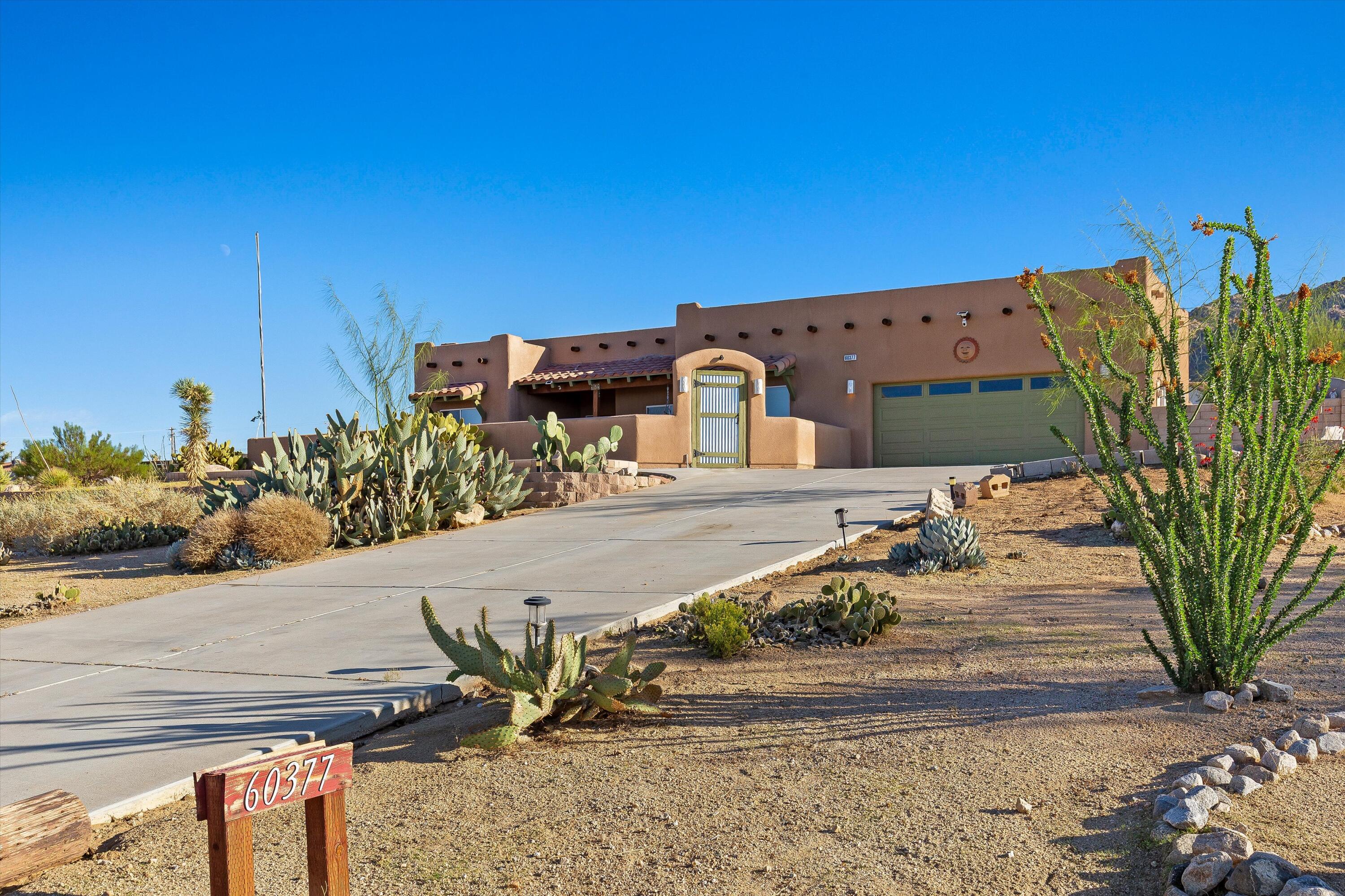 60377 Pueblo Trail Joshua Tree, CA 92252 - Photo 38 of 57 a view of a building with outdoor space