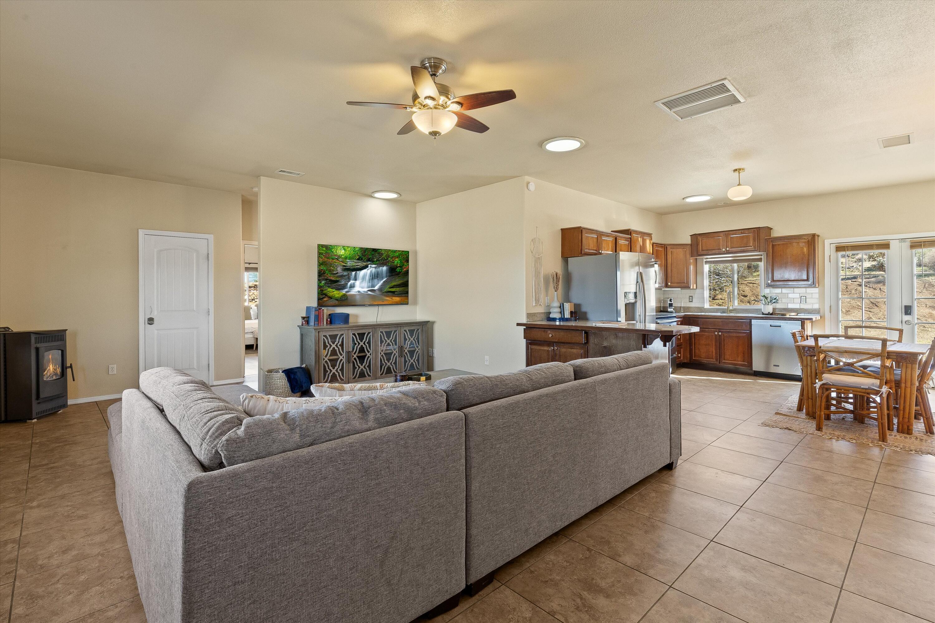 60377 Pueblo Trail Joshua Tree, CA 92252 - Photo 45 of 57 a living room with furniture kitchen view and a chandelier